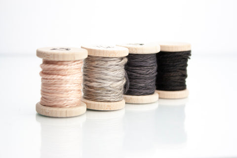 Hand spun and naturally dyed silk twines in blush, silver, gray and black by The Lesser Bear