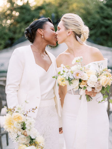 Two Brides with Bouquets at Franklin Park Conservatory Naturally Dyed Silk Ribbon by The Lesser Bear Photo by Nicole Clary Florals State and Arrow Styled and Planned by Meggie Francisco