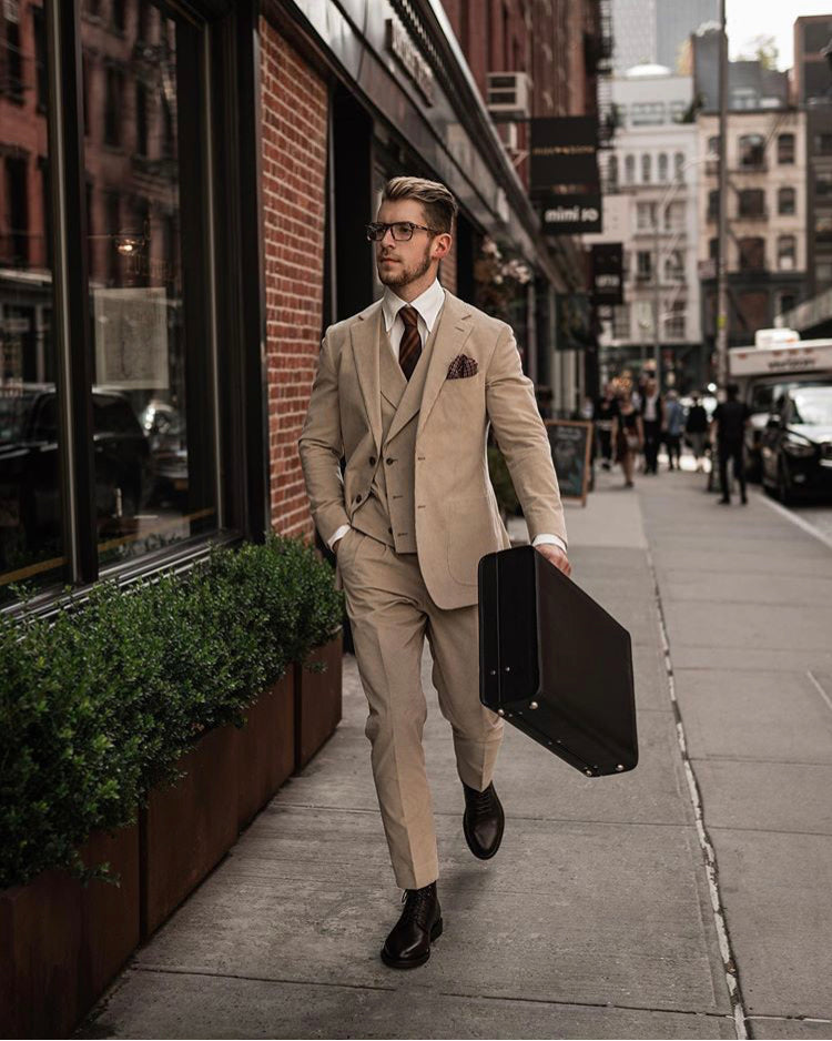 Suited man takes leather briefcase to New York City