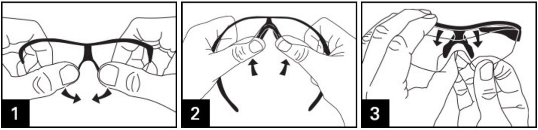 RADAR LENS REMOVAL INSTRUCTIONS With two fingers carefully pinch the two nose bridge tabs inward. Then push the nose bridge towards top of sunglasses until lens releases from top. Then pull lens down and out.