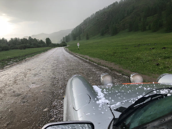 Nico Samaras and Mark Gudaitis compete in the Peking to Paris rally 2019 - Hail storm in Siberia