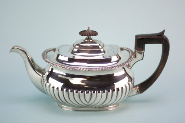 Polished silver teapot