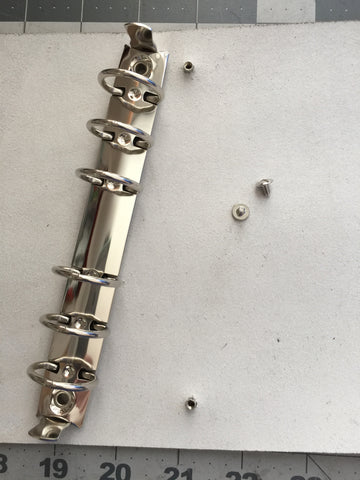metal binder spine and leather screws