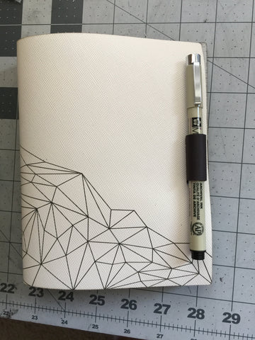 leather journal pen closure