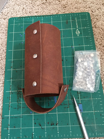 leather water bottle holder with rivets