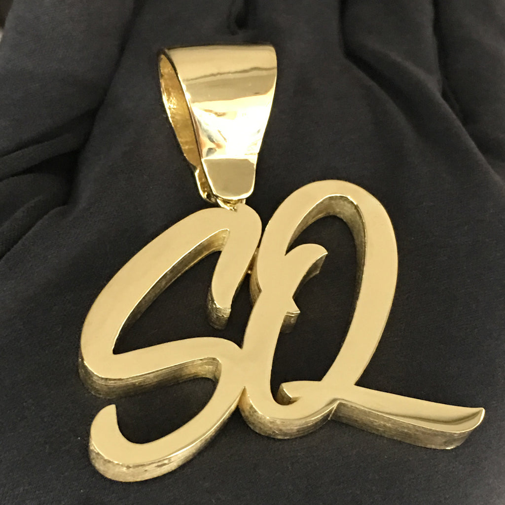 custom made SQ script letter solid pendant 14 karat yellow gold made by Popular Jewelry New York