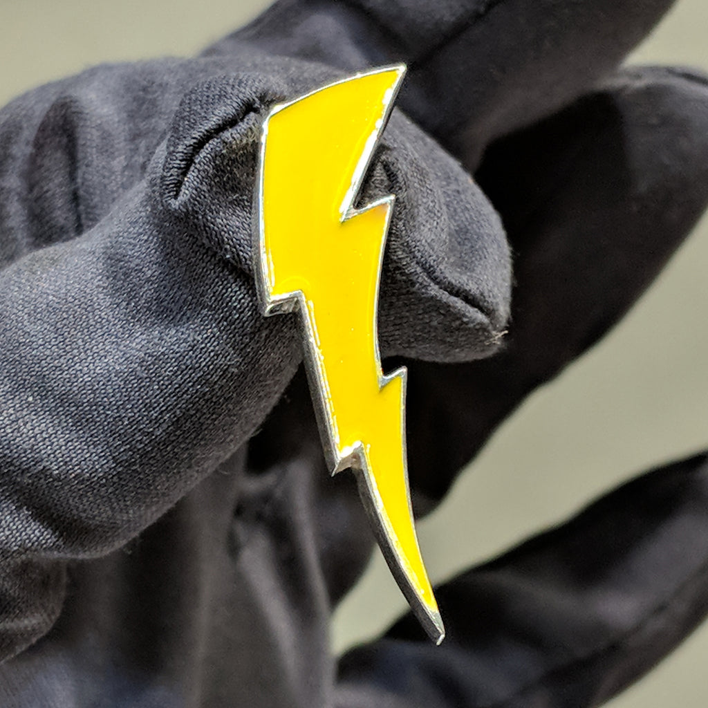 A customized lightning bolt pendant made for our client Zaire. The pendant is colored via usage of soft enamel.