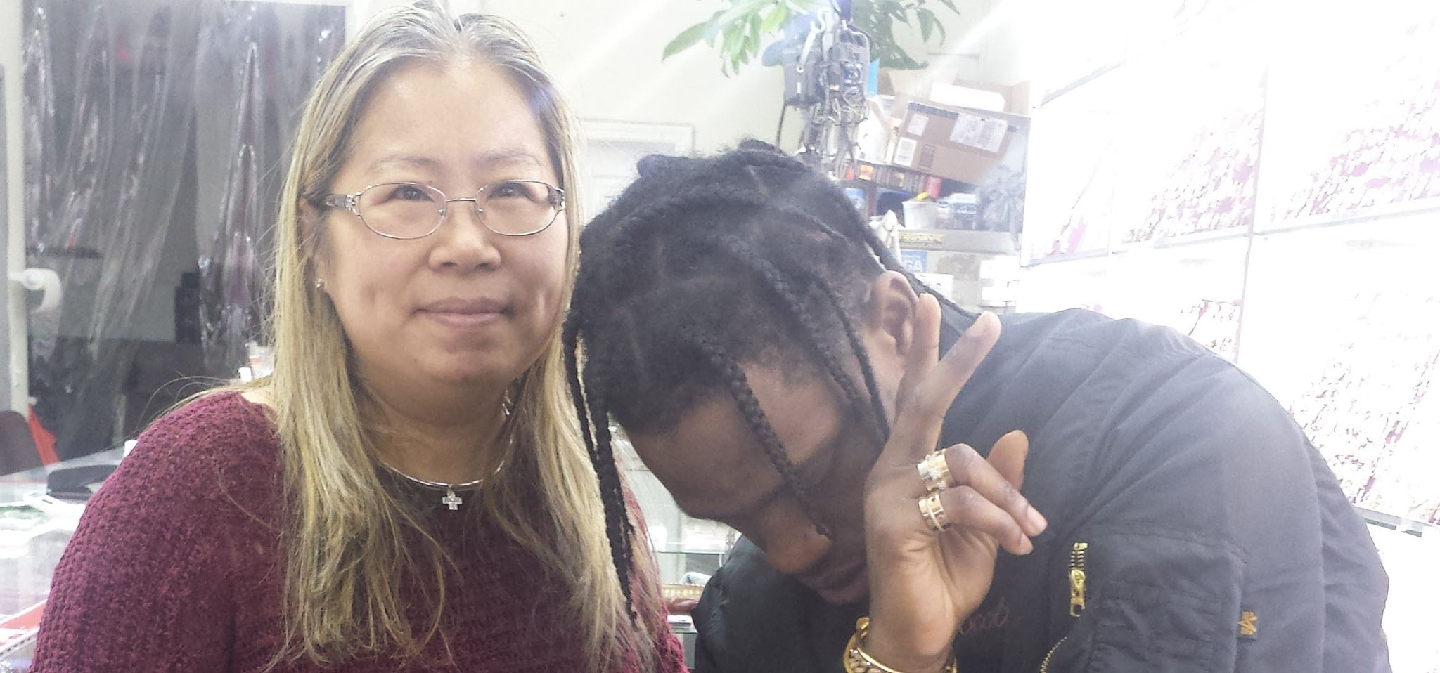 Travi$ Scott - Travis Scott is an American Hip Hop recording artist from Houston, Texas posing with Eva at Popular Jewelry