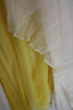 Detail yellow lining of the silk chiffon dress