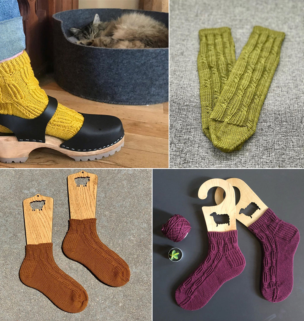 A square image showing 4 different socks that are knitted.