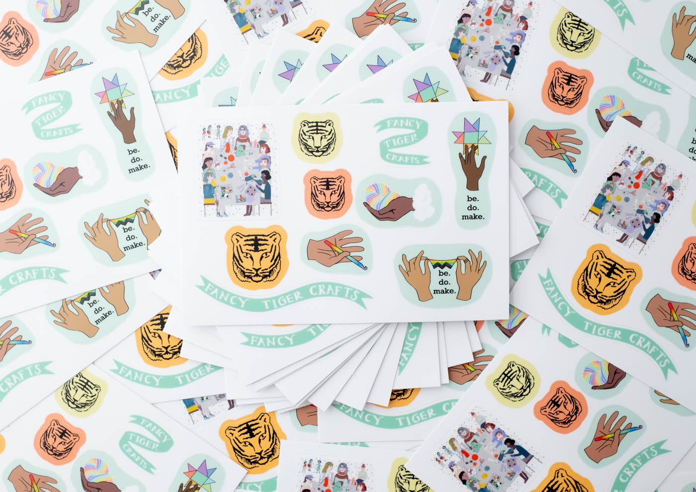 Photograph looking down on a stack of sticker sheets