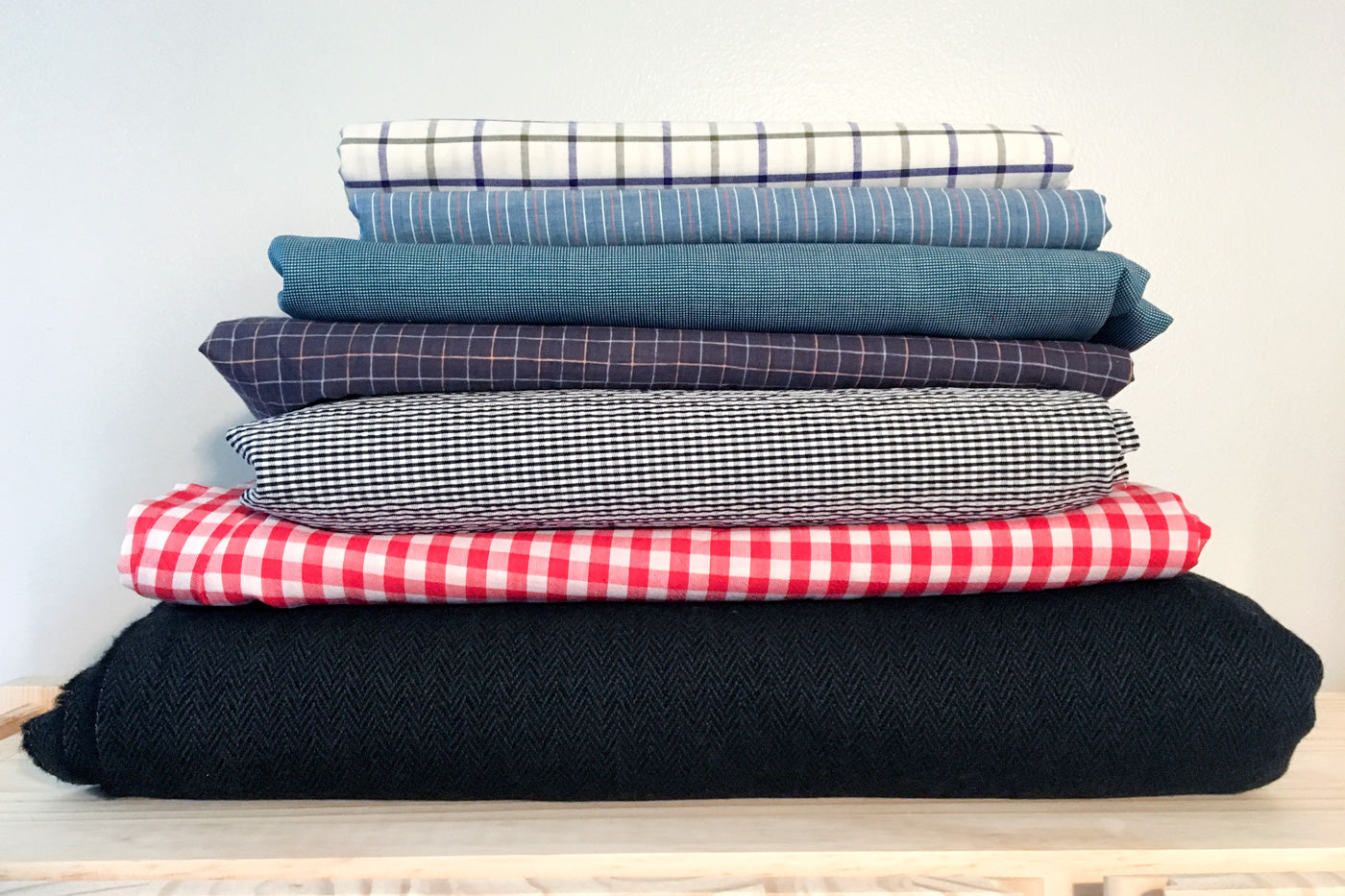 Stack of Wool and Plaid Shirtings