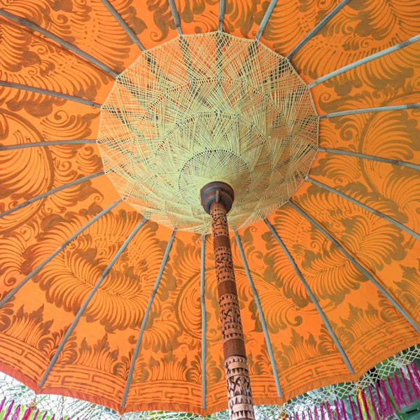 orange parasols wedding