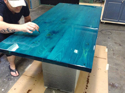 Solid fir desk top stained with tourquise and sealed with resin