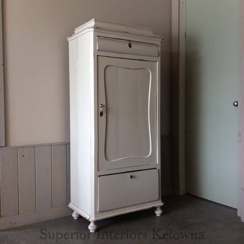 Antique bar cabinet refinished by Superior Interiors Kelowna