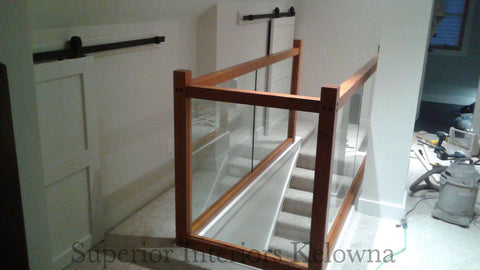 Custom built solid wood and glass railings by Superior Interiors Kelowna 