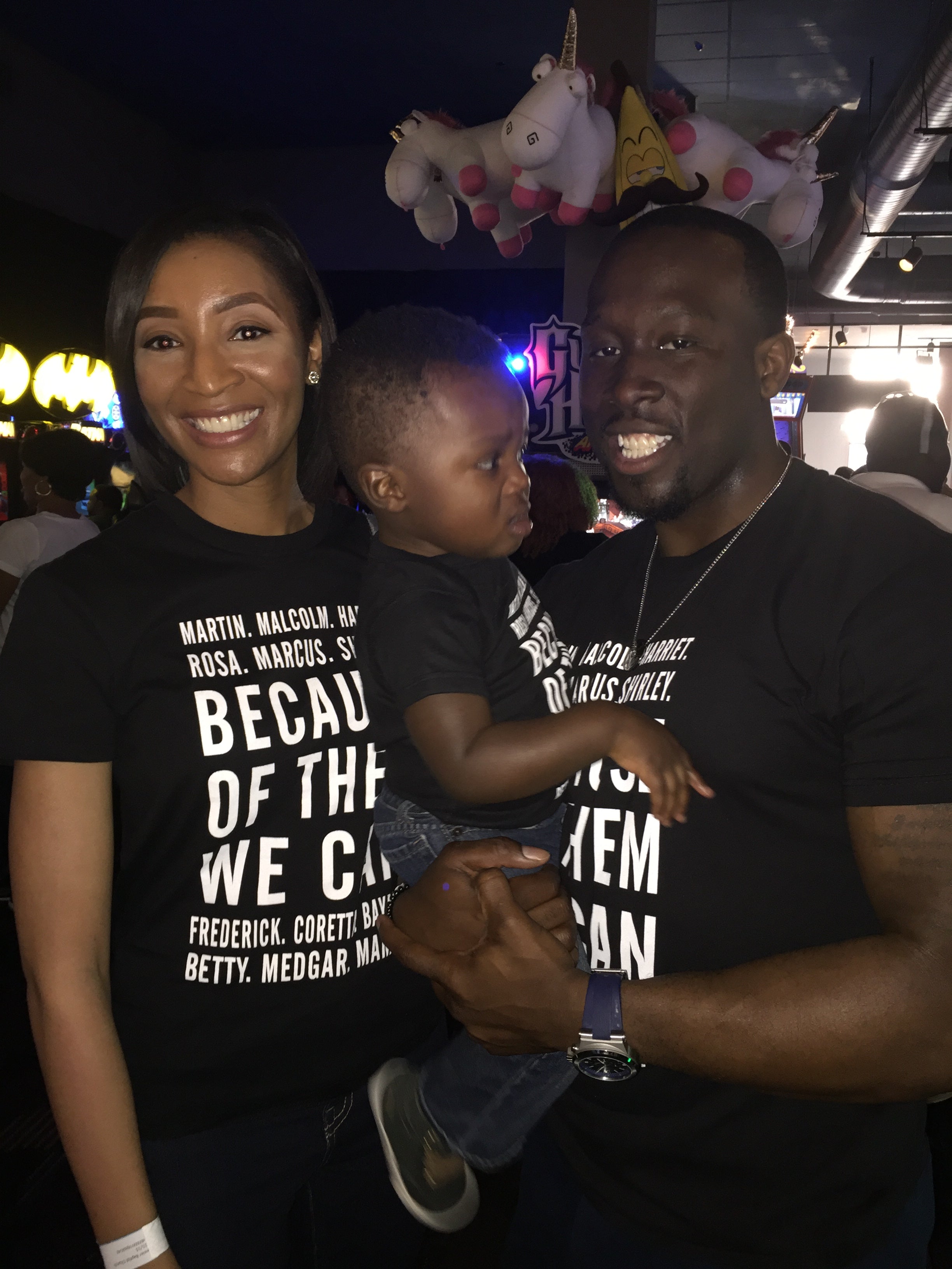 Brittany, son and husband at a fair