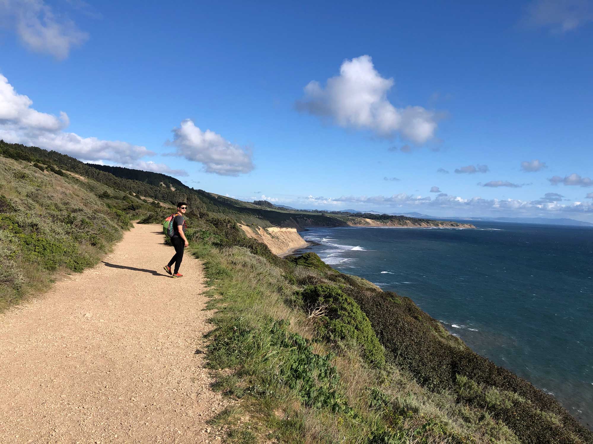 Hiker along the coast of California