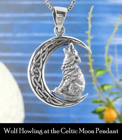wolf howling at celtic moon pendant