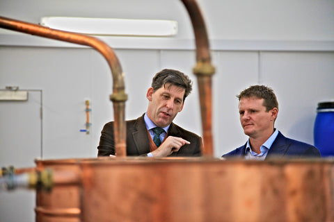 Pictured are Lord Duncan, UK Climate Change Minister (left) and Stephen Kemp, Owner of Orkney Distilling Ltd (right).