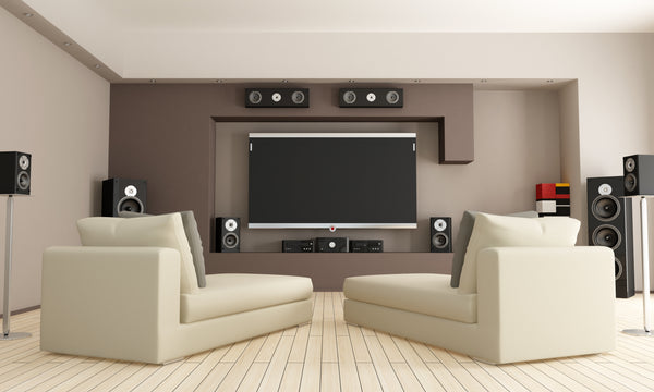 Home Theater with Surround Sound and White Couches 