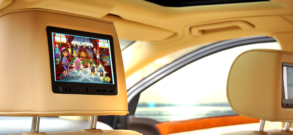 Headrest Monitors in a Tan SUV