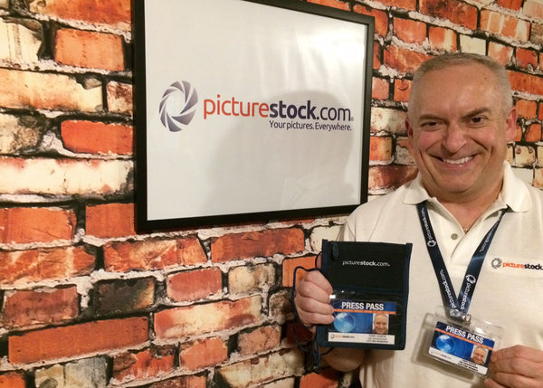 Tony Costa at Picture Stock offices showing their press pass