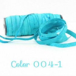 Roll of teal ribbon with color 004-1 caption below it