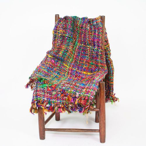yarn blanket over chair