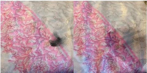 Two pictures showing a shiny white sari wrap skirt. The first pictures shows a small black smudge on the skirt. The second picture shows that the smudge has been easily removed by a little bit of nail polish remover. 