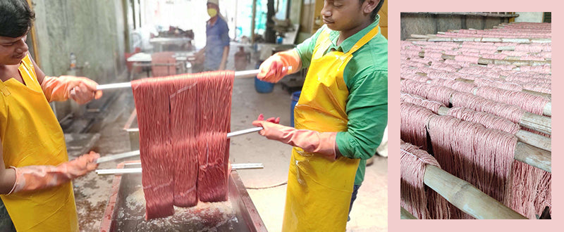 men hand dying yarn with Manjistha (India’s Madder Root)