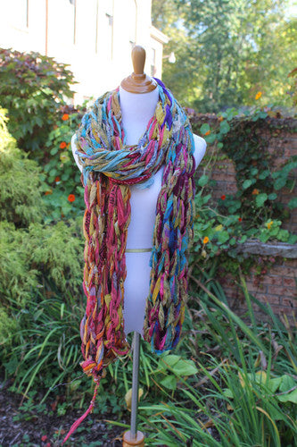 mannequin wearing a yarn scarf