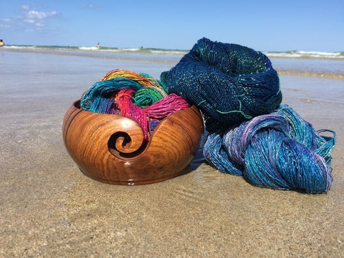yarn and yarn bowl over the beach