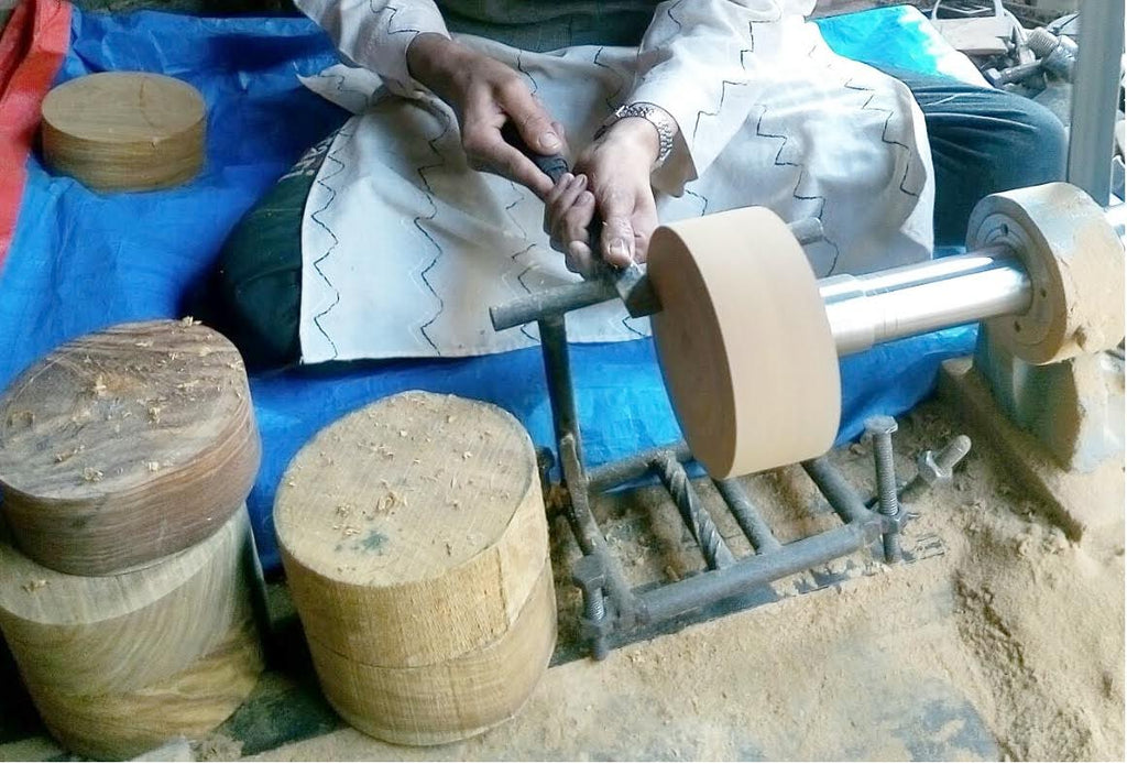 sheesham wood and an artisan