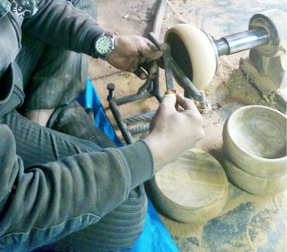 person making a yarn bowl from scratch