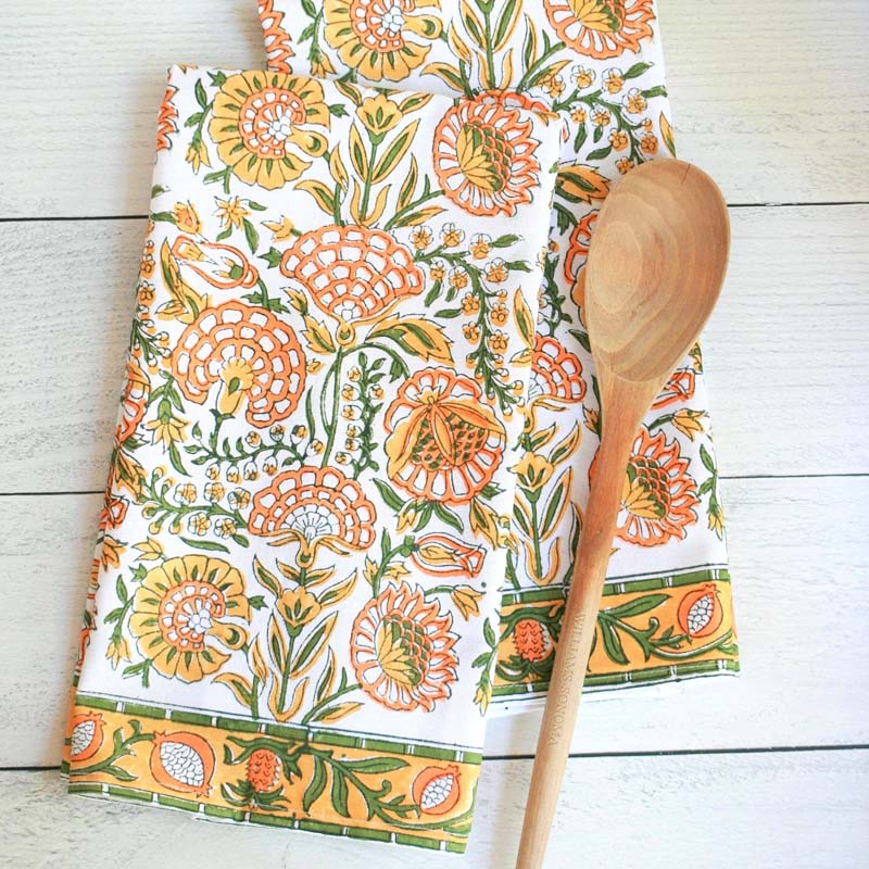 Pacific & Rose Textiles Kitchen Towels – Caroline Marigold displayed next to a wooden spoon