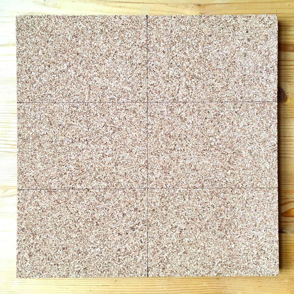 Cork board with lines drawn on it