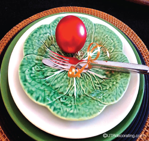 Display holiday ornaments on plates to create a festive look