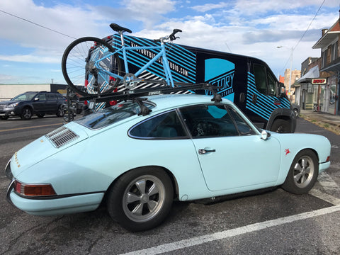 One of Clark's clients with his bike and matching Porsche 