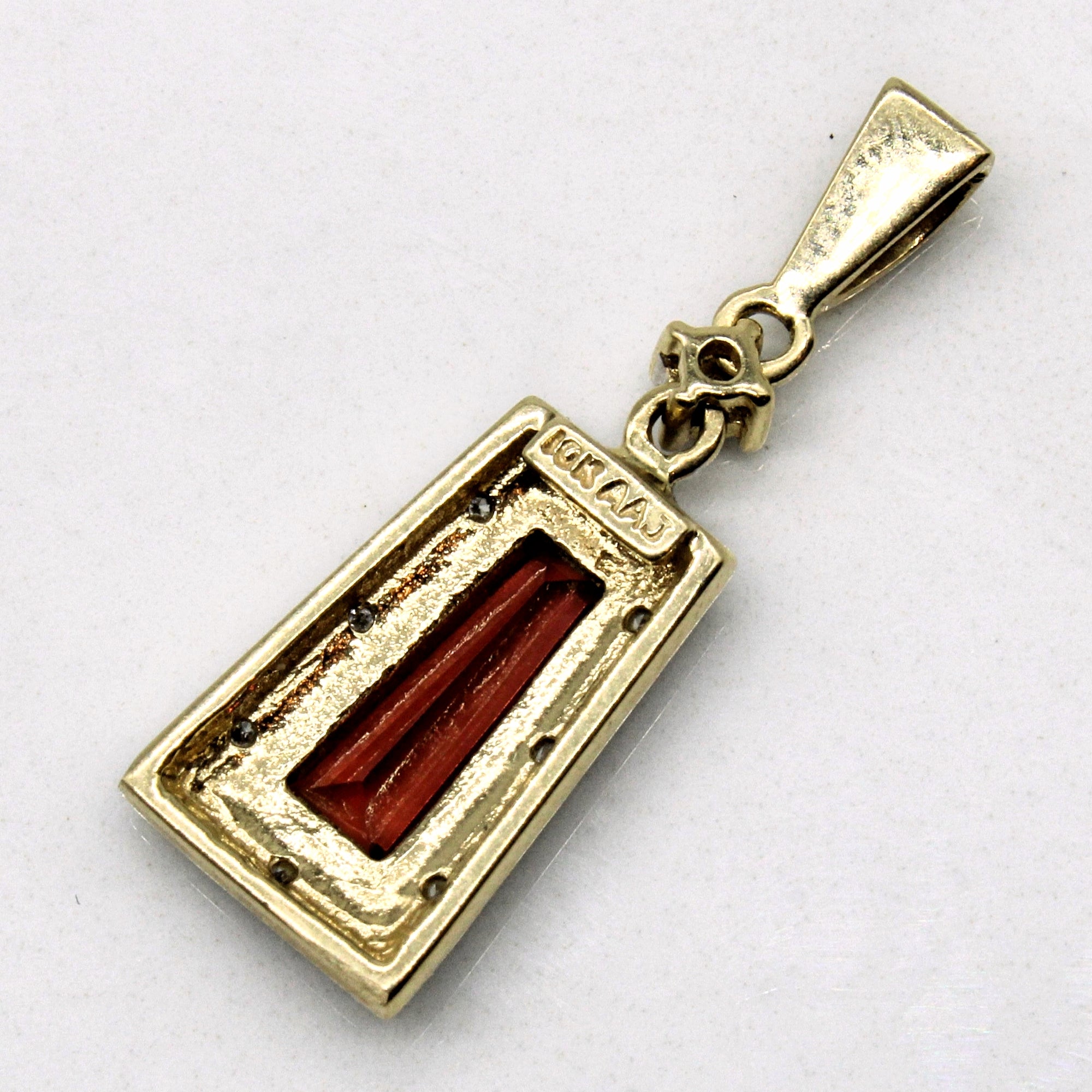 Halo Garnet & Diamond Pendant | 0.70ct, 0.04ctw |