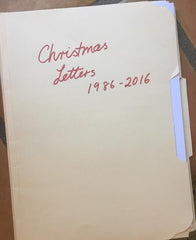 Folder 30 years of Christmas Letters