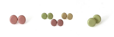 Round stud earrings in muted hues