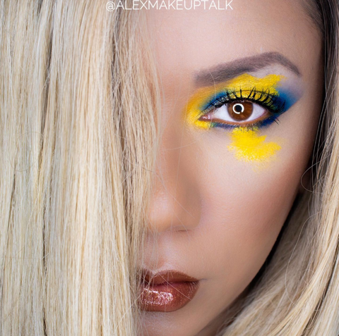 Beautiful yellow blue eyeshadow blonde hair brown lips