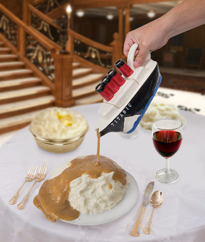 Titanic Gravy Boat pouring on pile of mashed potatoes on table