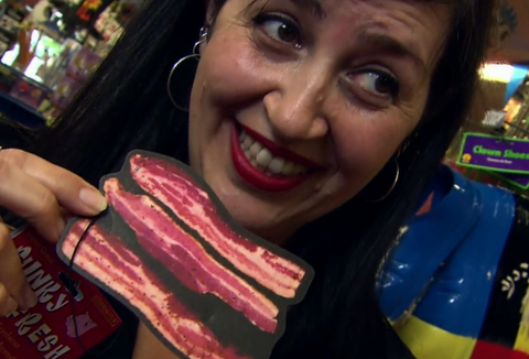 Shana Iverson smelling the bacon air freshener