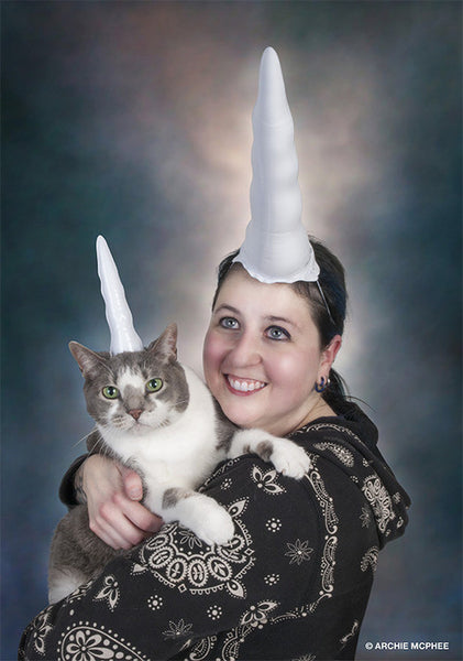 Spyke and Molly pose in Inflatable Unicorn Horns cat