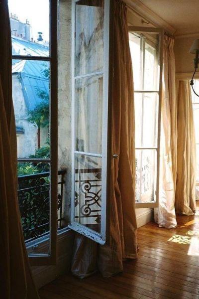 French windows with light linen curtains