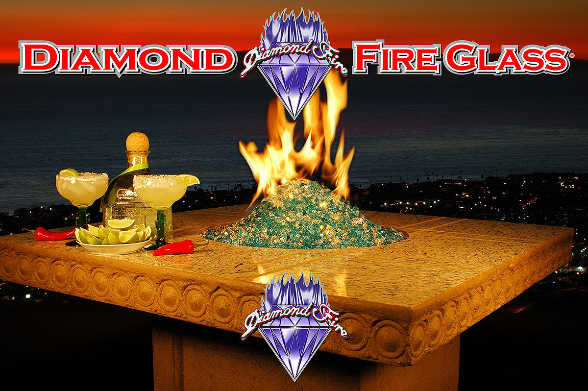 Teal and Gold fire pit fireplace glass installed in outdoor fire pit table