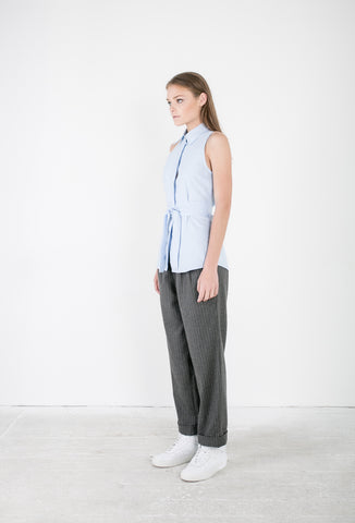 OSKAR blue wrap shirt and grey pin-striped woollen pants