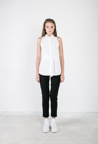 OSKAR white wrap shirt and black skinny leg pants